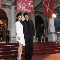 Lun Mei Gwei, Actress from the film BLACK COAL, THIN ICE with Yi'nan Diao - Director of the film BLACK COAL, THIN ICE at Red Carpet, National Theatre, Sarajevo Film Festival, 2014 (C) Obala Art Centar